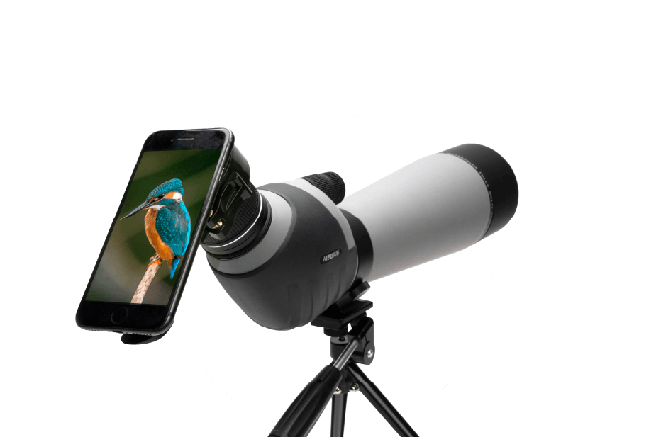 A bird watching spotting scope with a phone attached to take pictures with